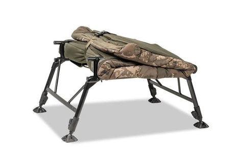 Bed Chair Nash Indulgence 4 Junioren Sleep System Camo - Tienda Carpfishing